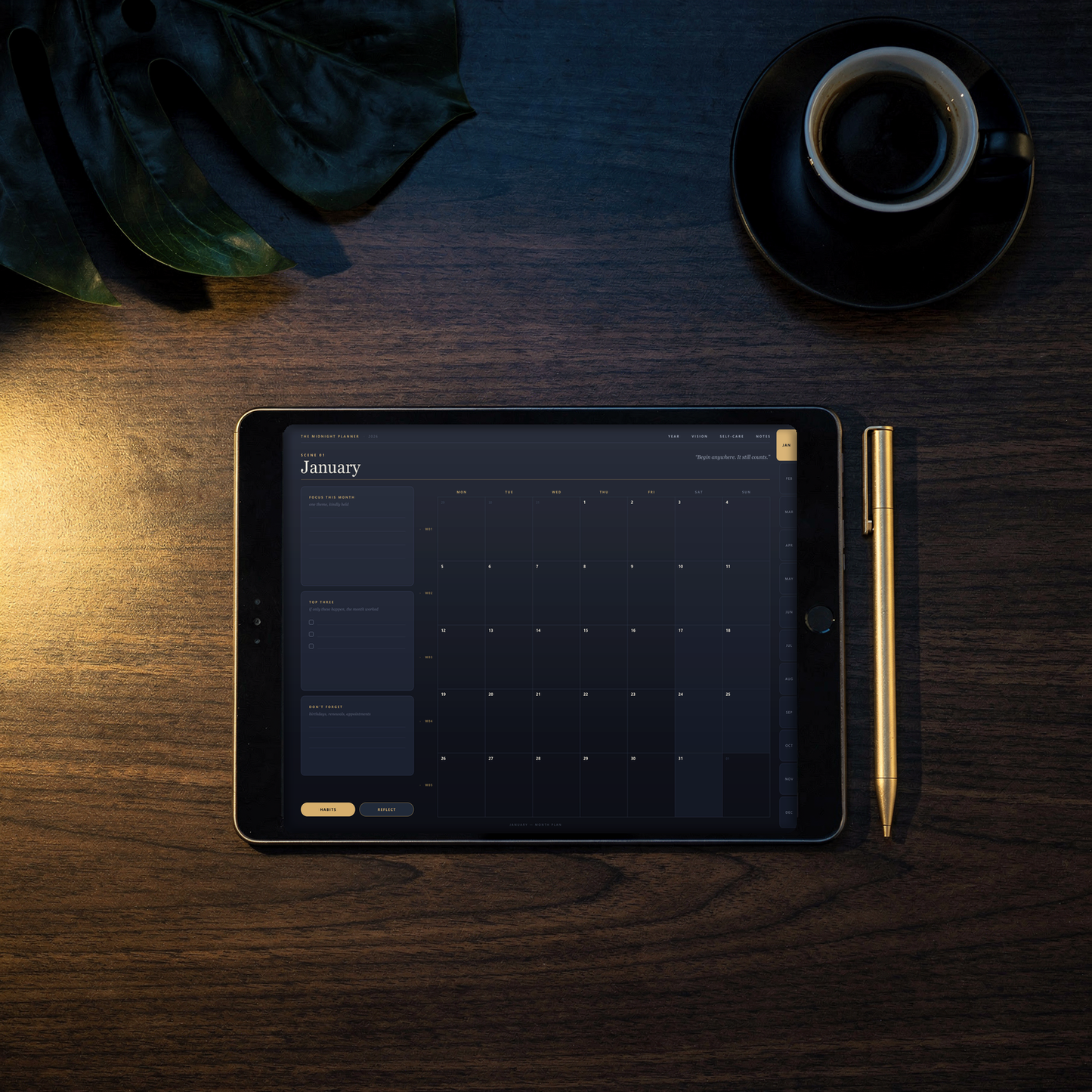 2026 ADHD digital planner open on a tablet on a dark walnut desk at night — the real January monthly page with gold month tabs shown on screen, beside a gold stylus and an espresso cup